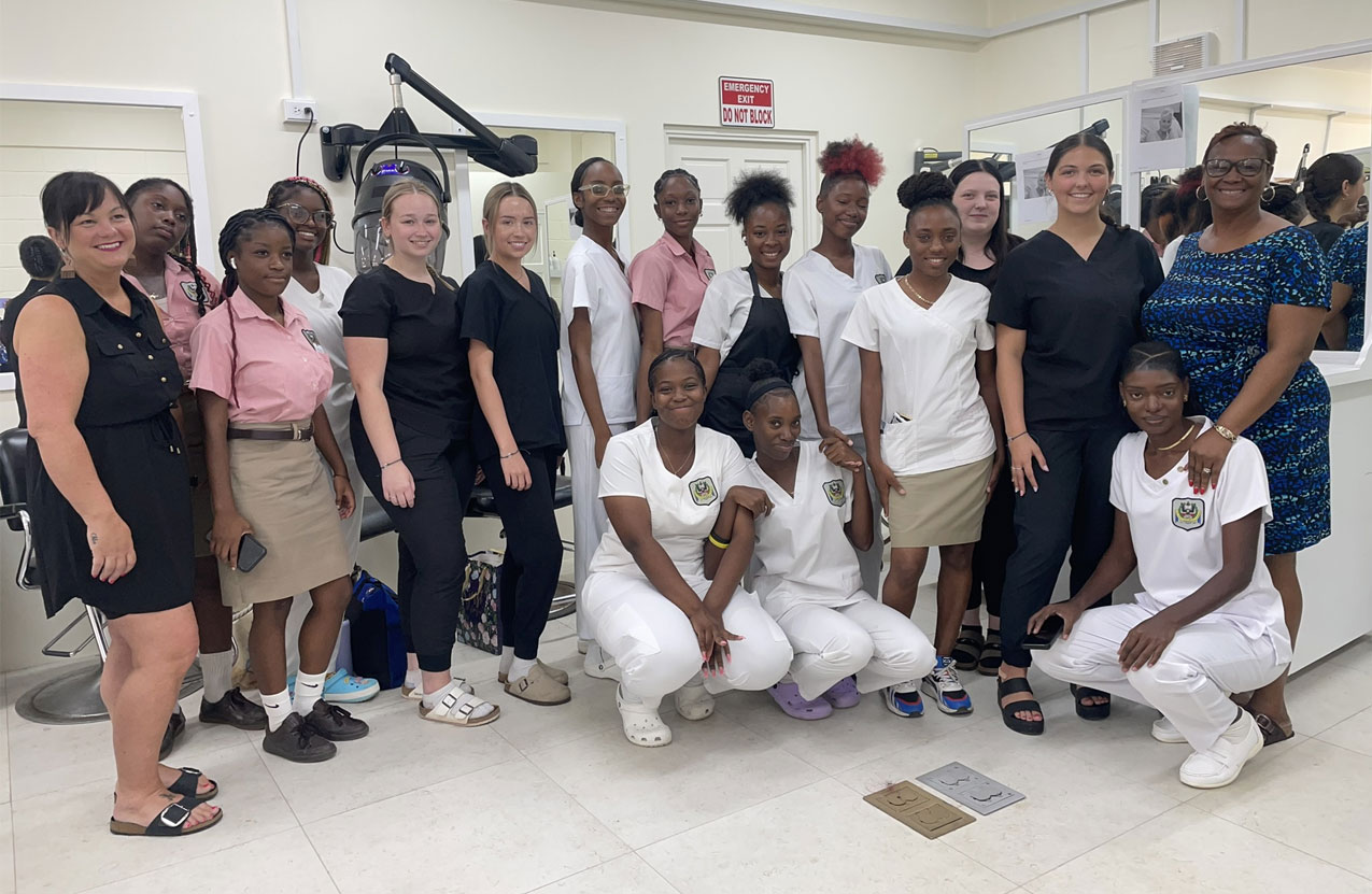 A group of students from NSCC and SJPI stand together for a photo during their learning exchange in Barbados.