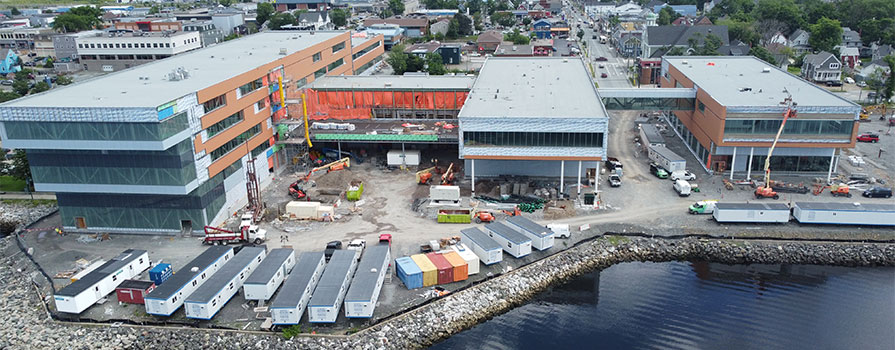 A drone shows an overhead view of a new campus being built.