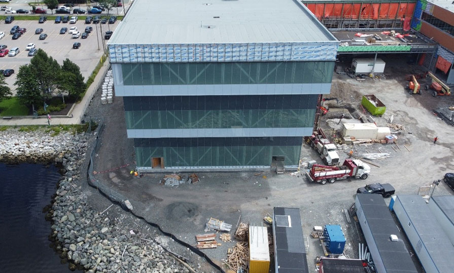 A flying drone shows a new campus under construction on on the Sydney harbourfront.