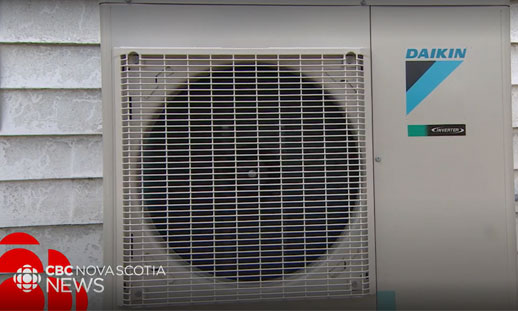 A heat pump outside a home is shown.