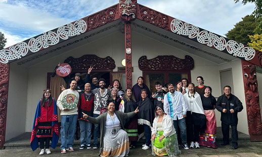A group of students stand together for a photo.