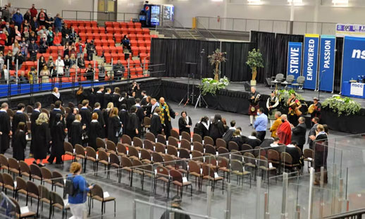 NSCC Marconi Campus spring 2022 graduates enter to applause before the start of the convocation on Friday at Membertou Sports and Wellness Centre. It was the first in-person convocation since the COVID-19 pandemic hit Canada in 2020. NICOLE SULLIVAN/CAPE BRETON POST - Nicole Sullivan