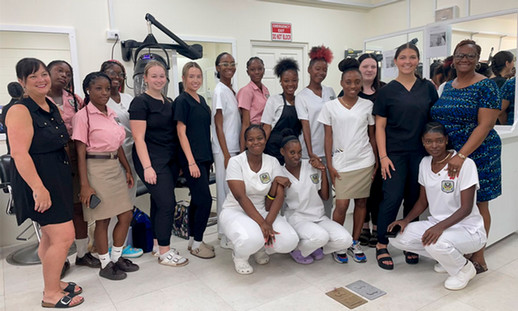A group of students from NSCC and SJPI stand together for a photo during their learning exchange in Barbados.