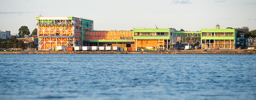 The Sydney Waterfront Campus is pictured from across Sydney Harbour. It is under construction.
