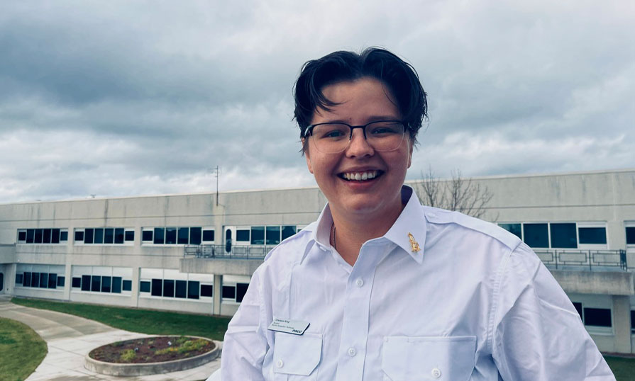 Chelsea King standing in front of NSCC campus