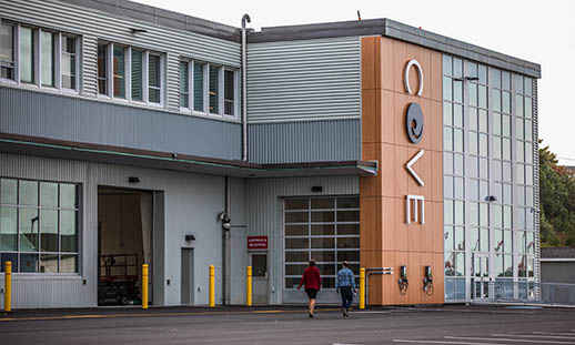The partial exterior of the Centre for Ocean Ventures and Entrepreneurship is shown. The letters C O V E are attached to the side of the building.