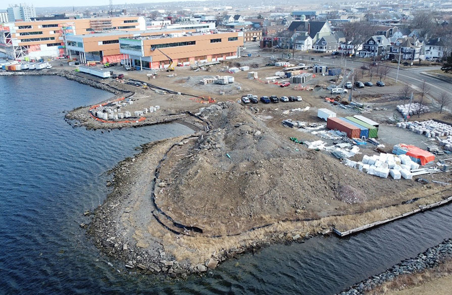 From the view of a drone, the empty site of a soon-to-be new campus is shown as it spans the Sydney Harbour front.