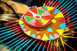 A close up of ceremonial, beaded Mi’kmaw attire.