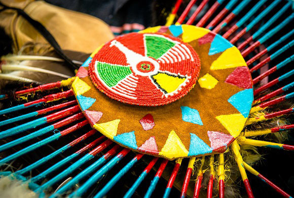 A close up of ceremonial, beaded Mi’kmaw attire.