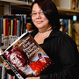 Riki Lee Christmas, a recent Nova Scotia Community College graduate, created a design for a new initiative that highlights Mi'kmaw content at the college's campus libraries across the province. 