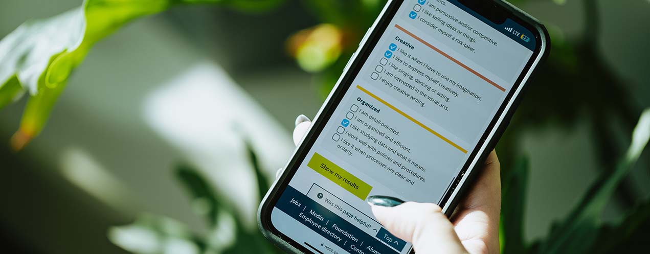 Profile of a woman at her computer taking the career quiz.