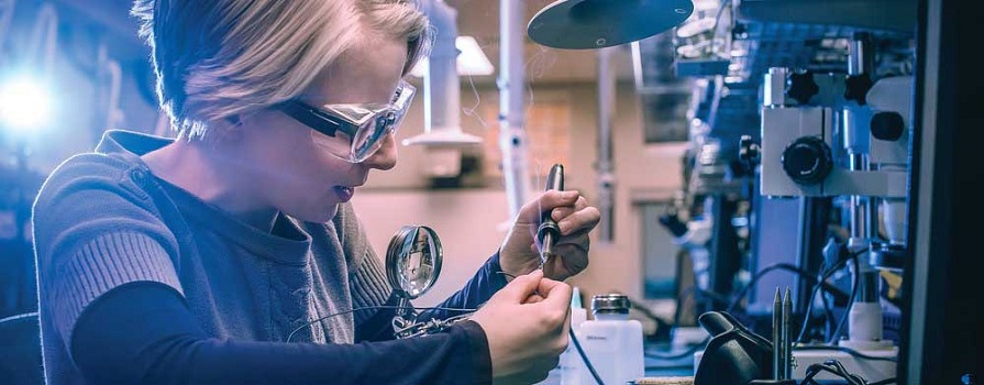 Sarah Yarr works on her soldering skills.