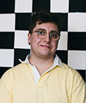 A headshot of Tim.