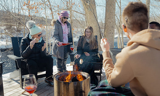 A group of hospitality and tourism students attend an outdoor tourism event.