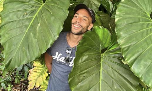 Tyree posing close to local vegetation