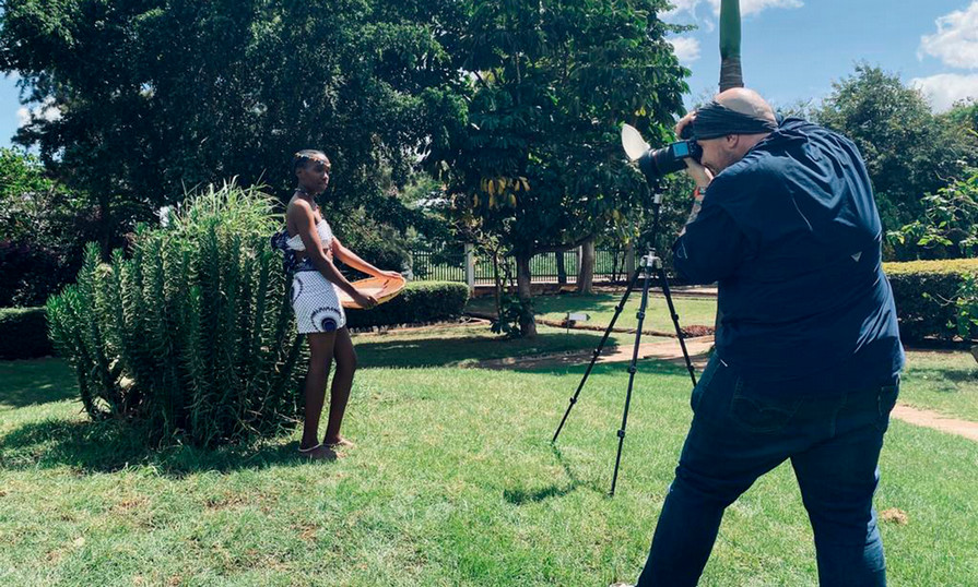 Zachary Daigle works on a photo shoot for a mini-venture project in Tanzania 