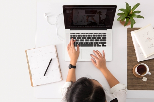 person working at laptop